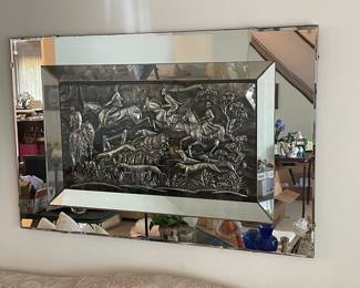 Hollywood Regency style, high relief, framed mirror “The Hunt.”