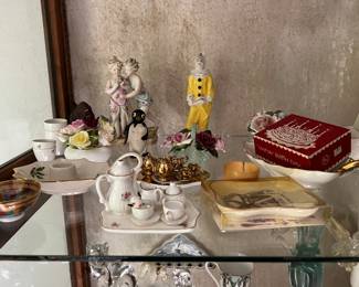Porcelain figurines, miniature tea sets