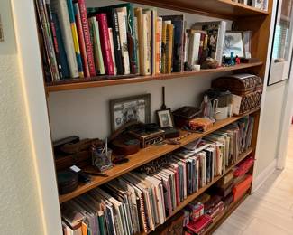 Books, baskets, pottery, wood boxes, paintings