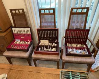 Two sets silver plate and one set mixed stainless