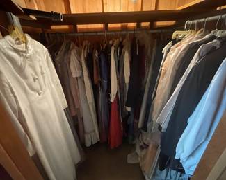 Secret closet with vintage dresses, skirts, evening wear and more.