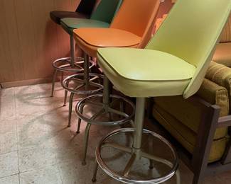 Custom made barstools in 1968. Matches colors of lower level.