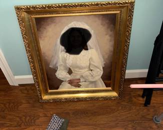 This portrait is showing the wedding dress we have for sale. We are selling the portrait for the very nice gold leaf frame.