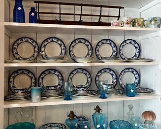 Blue plates. Blue cups. Blue pitcher.