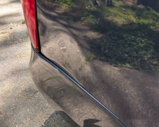 Dents on rear passenger quarter panel