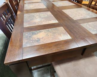 Tall dining table with hidden leaf and bar stool chairs