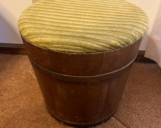 Wooden stool with upholstered lid