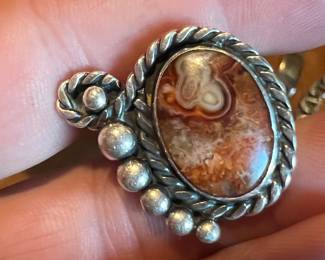 Real fossil cabochon by an original modernist. 