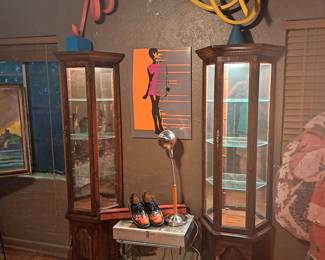 matching mirrored lighted display cabinets..1980s bend wood sculptures...flame shoes, 1960s style fashion picture