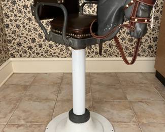 Antique child’s barber chair