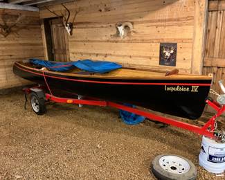 15ft sportsman boat and trailer. Custom fiberglass, maple and mahogany wood interior.