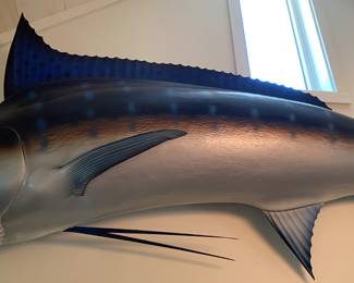 Majestic Blue Marlin Wall Mount made of fiberglass...8'7" in length, 30 inches dorsal to underside, 36 inches from top to bottom of tail.  We will take it off the wall, you will be responsible for transportation.