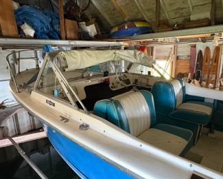 1970s 22 foot North American  fiberglass boat with a 160 hp MerCruiser engine. Engine needs work.