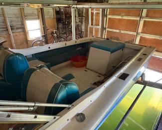 1970s  22 foot North American  fiberglass boat with a 160 hp MerCruiser engine. Engine needs work.