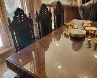 Ornate Mexican table with 8 chairs with glass top