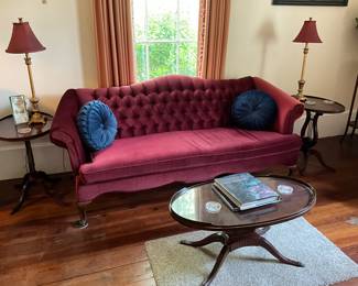Tufted sofa.