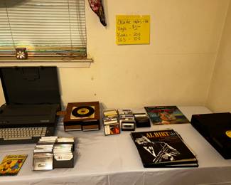 Typewriter, vinyls, cassette tapes, VCR