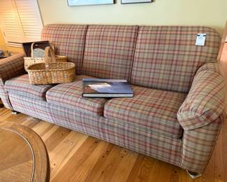 Plaid Couch, Baskets, Coffee Table Books