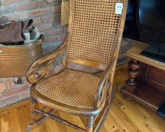 Antique Lincoln Caned Rocking Chair