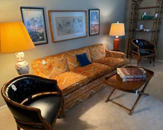 Faux Bamboo Leather Armchair (A), White Chinoiserie Porcelain Table Lamp, Decorative Side Table, Red Chinoiserie Porcelain Table Lamp, Faux Bamboo Leather Armchair (B), Faux Bamboo Metal Etagere, Africa Coffee Table Books, Knob Creek Tray Table