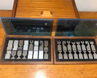 Austin Cox for Alcoa Aluminum chess set, likely from the 1960s, housed in its original case. 