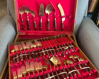 vintage Thai flatware set, likely from the mid-20th century, made of bronze with rosewood handles, from Bangkok, Thailand. 