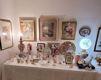 Variety of glassware and collectibles. Antique Hand Painted, Double Globe "Gone With The Wind" converted Hurricane/Parlour Lamp, in excellent condition. Antique converted Kerosene lamp (far left) Assorted framed, prints, paintings and needlepoint art. Royal Dalton Dancer Figurine. Lladro Swan. Hutschenreuther Ballet Dancer. Etc...