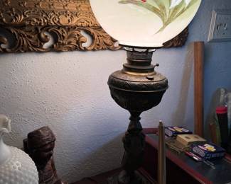 Vintage lamp with glass globe.