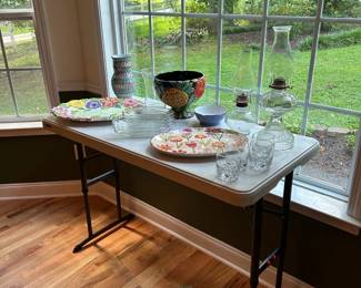 Serving platters and dishes, oil lamps