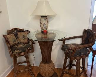 Round glass top high top table with 2 swivel stools