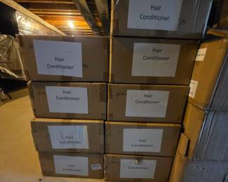 Boxes and Boxes of ReviveMe Caffeine Shampoo and Conditioner