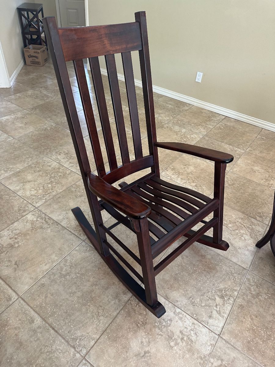 Dark wood rocking chair