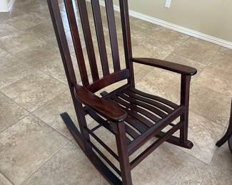 Dark wood rocking chair