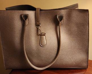 Unsure of Designer (Probably off brand of handbag)