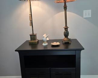 Black Cabinet with Glass Doors & Open Storage at top.  2 Lamps