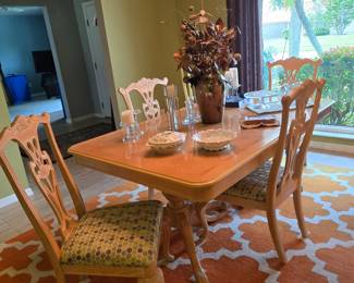 Table has 4 Chairs.  There are 2 Leafs, 13" each, not shown