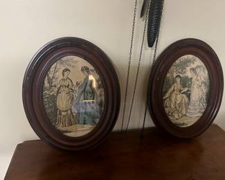 Antique prints in oval frames