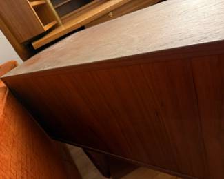 The "Corona" sideboard in teak with rosewood handles