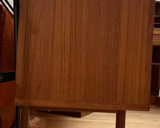 The "Corona" sideboard in teak with rosewood handles