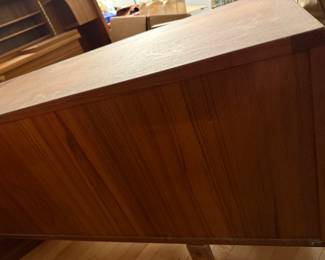 The "Corona" sideboard in teak with rosewood handles