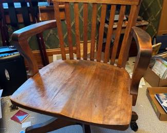 Wooden rolling office chair 