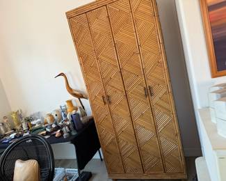 Great, I think bamboo, two door storage cabinet and very tall...
