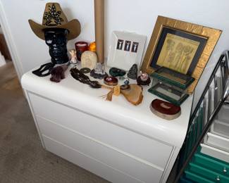 Glass head with hat, Egyptian picture and more stones.