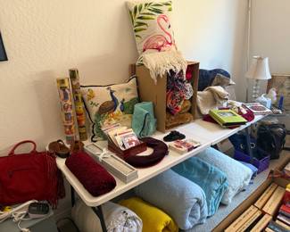 pillows, blankets and Egyptian pictures in tubes