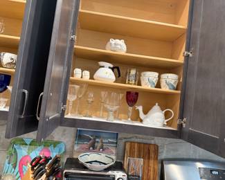 more kitchen, platters, cutting boards and toaster oven