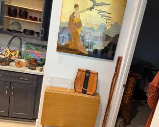 small folding table, leather purse and a great piece of art, walking sticks