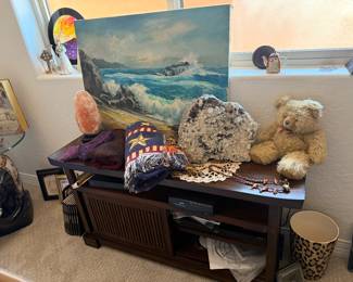 Original water scene, a large rock, salt lamp and small cabinet great for your video and audio electronics