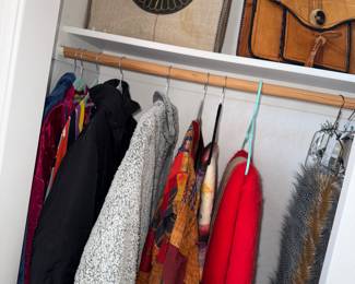 Leather purse and some sort of travel bag...and more clothes, jackets etc...