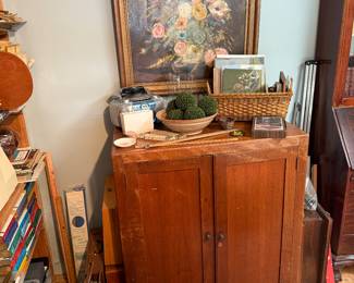 Studio
Cabinet
Floral still life painting by Marjorie Walters’65
CD player
