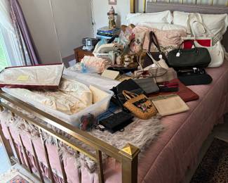 Bedroom 1
Brass full size bed
Purses
Wedding Dress